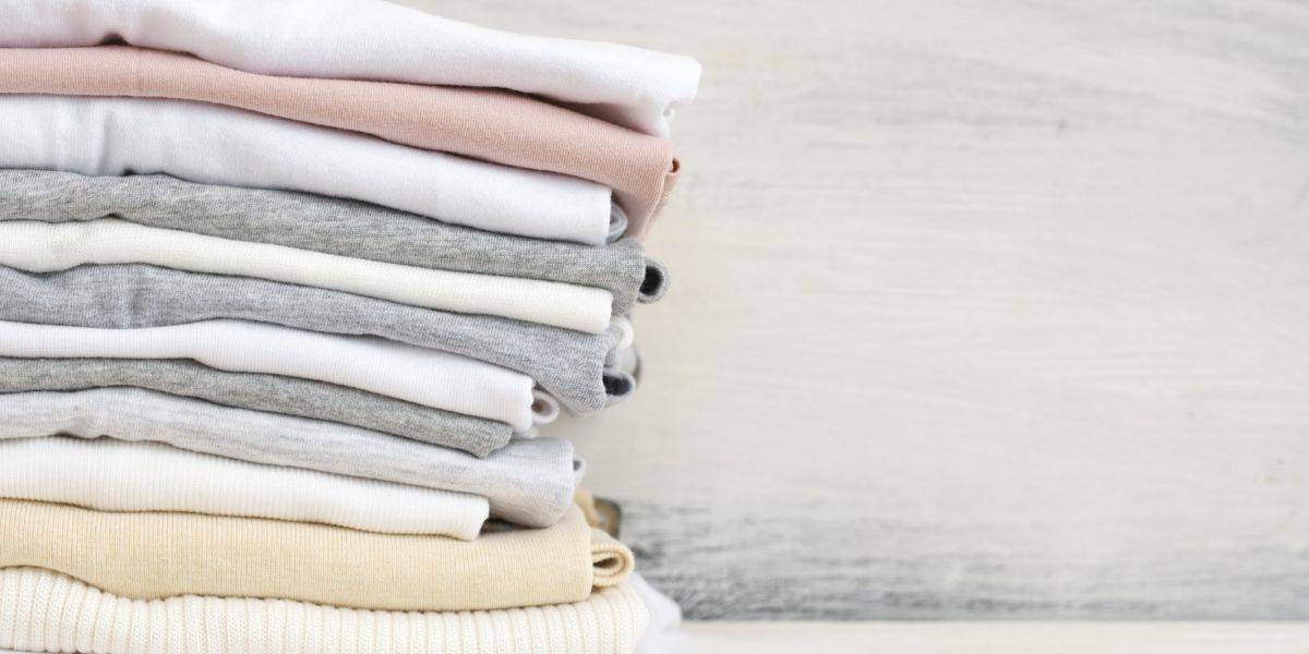 Stack of sustainably-made t-shirts