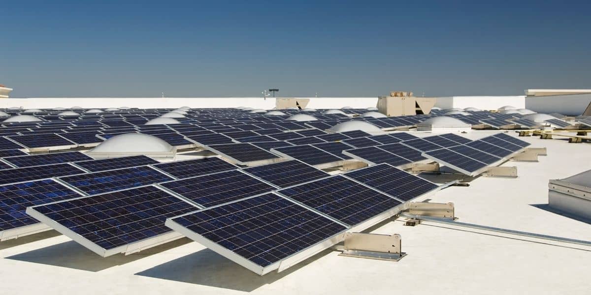 Solar panels on a flat roof.